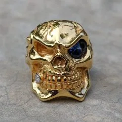 Bikerringshop Micron Yellow Gold Blue Eye Skull Ring